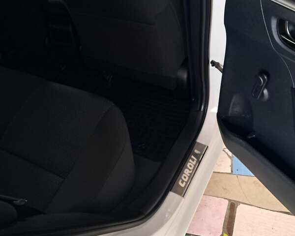 Белый Тойота Королла, объемом двигателя 1.33 л и пробегом 26 тыс. км за 14600 $, фото 17 на Automoto.ua