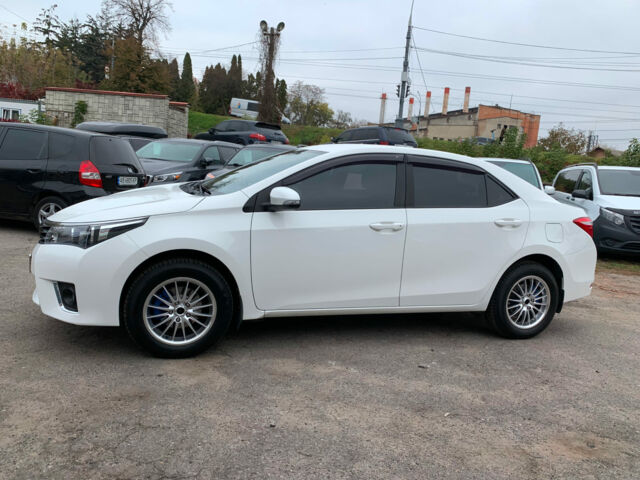 Белый Тойота Королла, объемом двигателя 1.3 л и пробегом 150 тыс. км за 12390 $, фото 7 на Automoto.ua