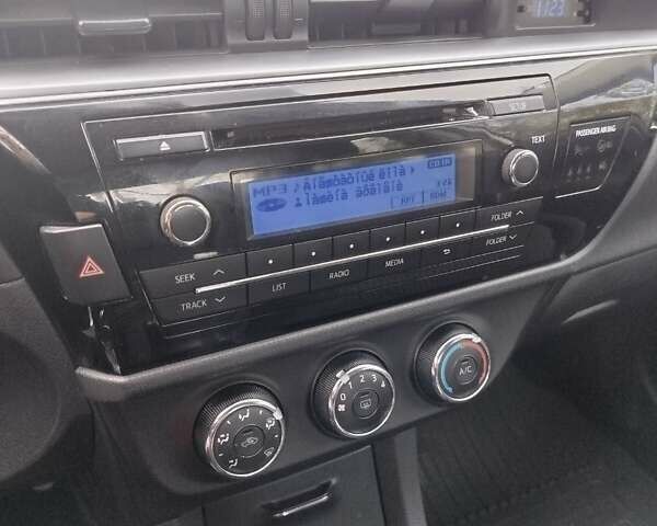 Белый Тойота Королла, объемом двигателя 1.33 л и пробегом 204 тыс. км за 8700 $, фото 7 на Automoto.ua