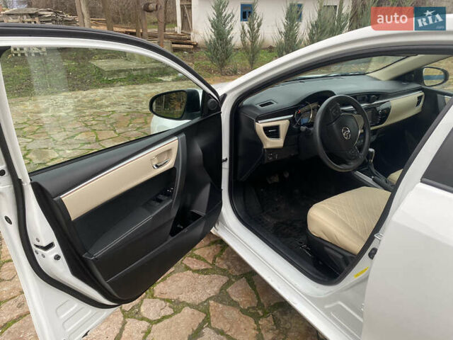 Белый Тойота Королла, объемом двигателя 1.8 л и пробегом 47 тыс. км за 10999 $, фото 25 на Automoto.ua