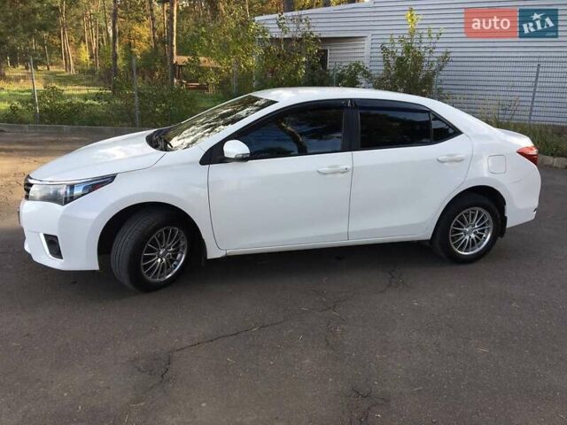 Білий Тойота Королла, об'ємом двигуна 1.33 л та пробігом 150 тис. км за 10000 $, фото 8 на Automoto.ua