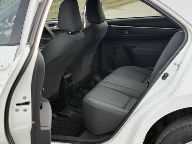 Белый Тойота Королла, объемом двигателя 1.6 л и пробегом 169 тыс. км за 9900 $, фото 11 на Automoto.ua