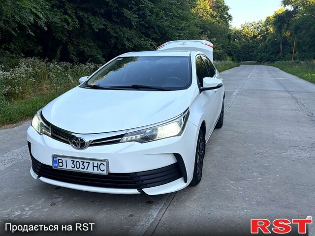 Білий Тойота Королла, об'ємом двигуна 1.3 л та пробігом 121 тис. км за 11500 $, фото 4 на Automoto.ua