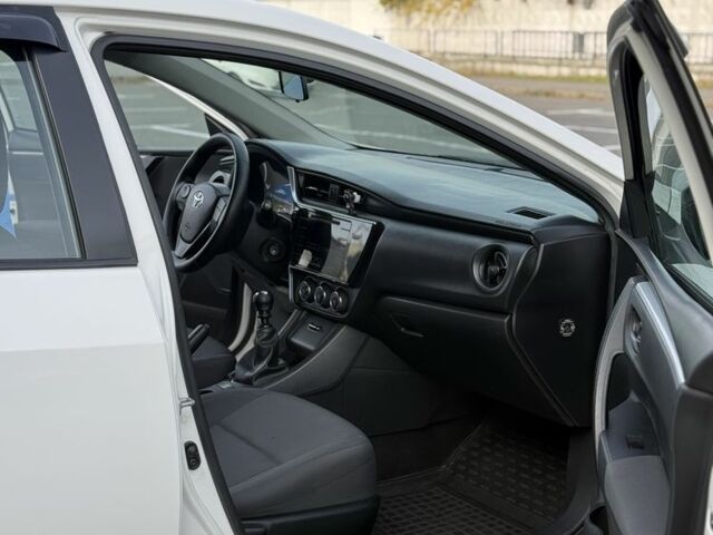 Белый Тойота Королла, объемом двигателя 1.6 л и пробегом 169 тыс. км за 9900 $, фото 8 на Automoto.ua