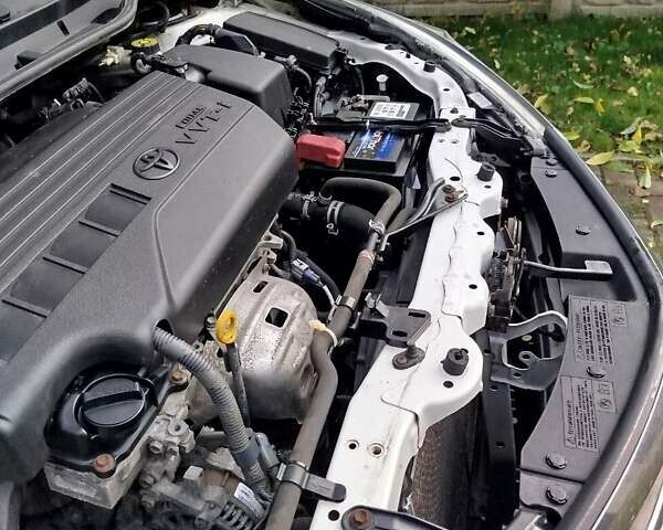 Белый Тойота Королла, объемом двигателя 1.33 л и пробегом 204 тыс. км за 8700 $, фото 11 на Automoto.ua