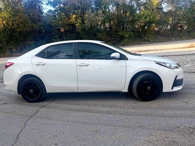 Белый Тойота Королла, объемом двигателя 1.6 л и пробегом 203 тыс. км за 10000 $, фото 1 на Automoto.ua