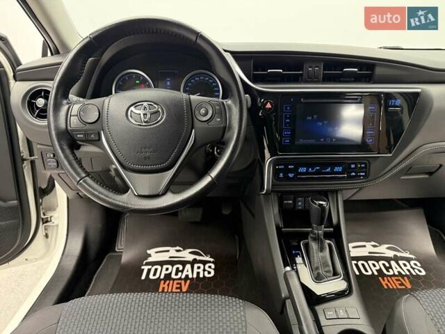 Белый Тойота Королла, объемом двигателя 1.6 л и пробегом 45 тыс. км за 15700 $, фото 40 на Automoto.ua