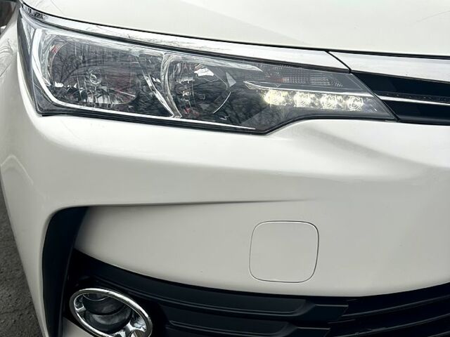 Білий Тойота Королла, об'ємом двигуна 1.6 л та пробігом 205 тис. км за 13700 $, фото 8 на Automoto.ua