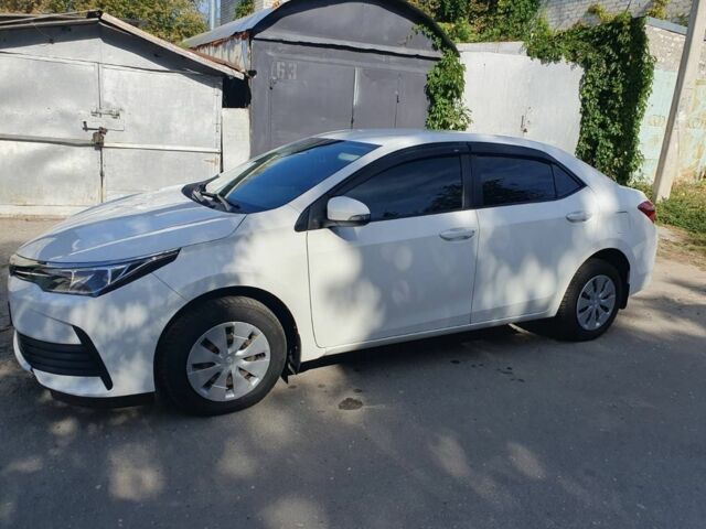 Белый Тойота Королла, объемом двигателя 1.3 л и пробегом 190 тыс. км за 12500 $, фото 7 на Automoto.ua