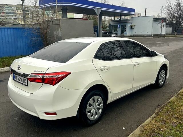 Білий Тойота Королла, об'ємом двигуна 1.6 л та пробігом 205 тис. км за 13700 $, фото 4 на Automoto.ua