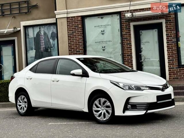Білий Тойота Королла, об'ємом двигуна 1.6 л та пробігом 45 тис. км за 18000 $, фото 3 на Automoto.ua