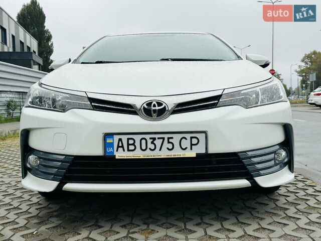 Білий Тойота Королла, об'ємом двигуна 1.6 л та пробігом 72 тис. км за 13700 $, фото 3 на Automoto.ua