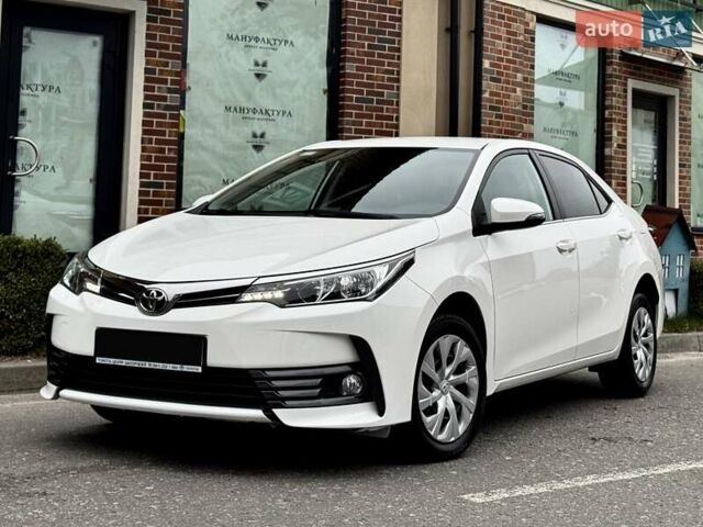 Білий Тойота Королла, об'ємом двигуна 1.6 л та пробігом 45 тис. км за 18000 $, фото 5 на Automoto.ua