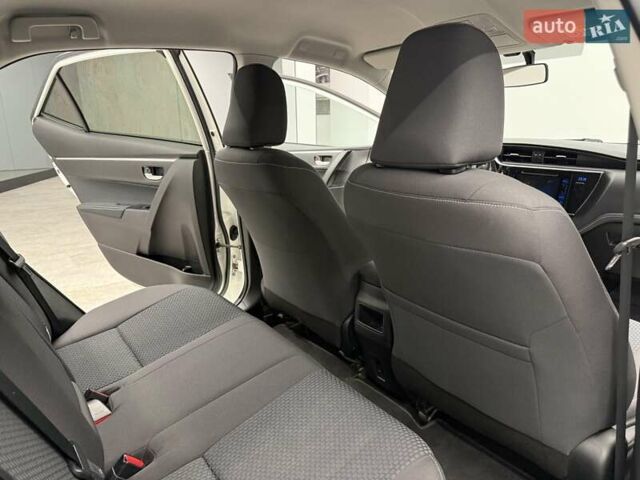Белый Тойота Королла, объемом двигателя 1.6 л и пробегом 45 тыс. км за 15700 $, фото 30 на Automoto.ua