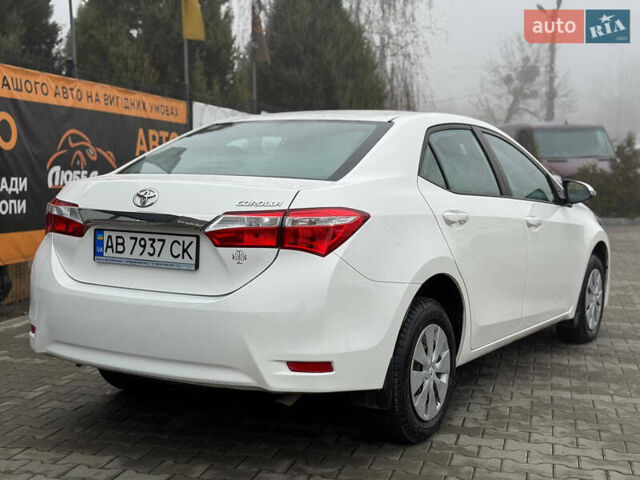 Белый Тойота Королла, объемом двигателя 1.6 л и пробегом 55 тыс. км за 13900 $, фото 6 на Automoto.ua