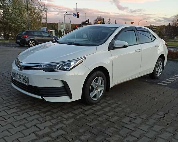 Белый Тойота Королла, объемом двигателя 1.6 л и пробегом 147 тыс. км за 12700 $, фото 1 на Automoto.ua