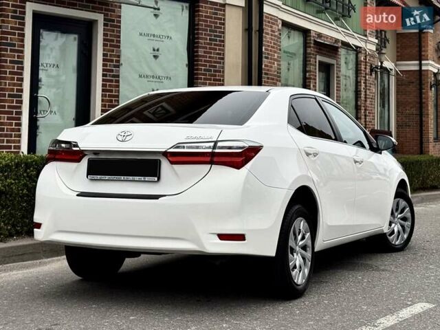 Білий Тойота Королла, об'ємом двигуна 1.6 л та пробігом 45 тис. км за 18000 $, фото 13 на Automoto.ua