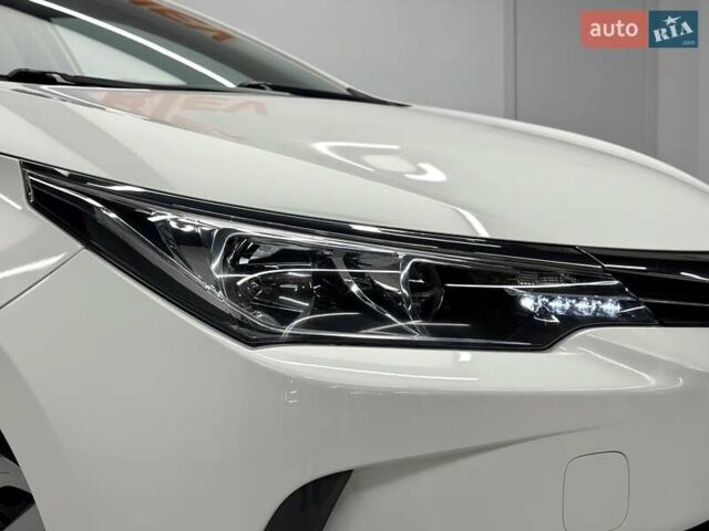 Белый Тойота Королла, объемом двигателя 1.6 л и пробегом 45 тыс. км за 15700 $, фото 17 на Automoto.ua