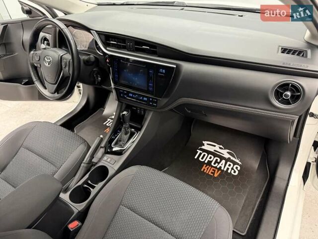 Белый Тойота Королла, объемом двигателя 1.6 л и пробегом 45 тыс. км за 16700 $, фото 30 на Automoto.ua