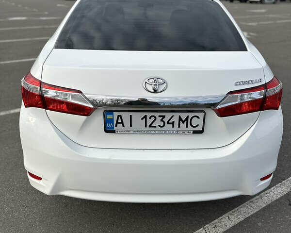 Белый Тойота Королла, объемом двигателя 1.6 л и пробегом 143 тыс. км за 13500 $, фото 5 на Automoto.ua