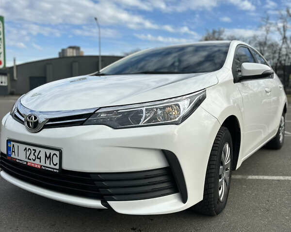 Белый Тойота Королла, объемом двигателя 1.6 л и пробегом 143 тыс. км за 13500 $, фото 2 на Automoto.ua