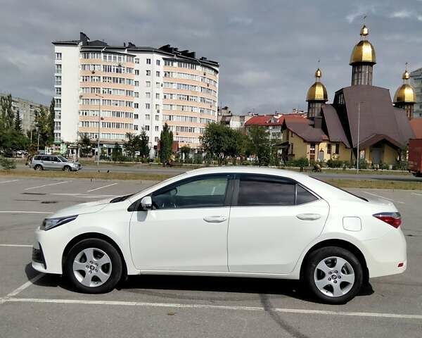 Білий Тойота Королла, об'ємом двигуна 1.6 л та пробігом 77 тис. км за 14000 $, фото 4 на Automoto.ua