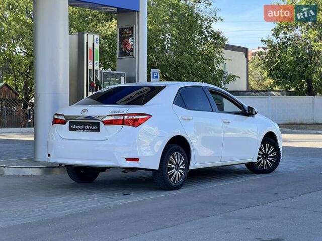 Белый Тойота Королла, объемом двигателя 1.6 л и пробегом 176 тыс. км за 13999 $, фото 2 на Automoto.ua