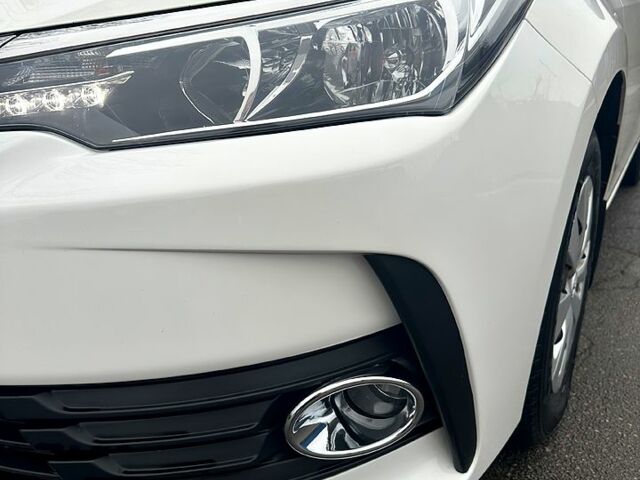 Білий Тойота Королла, об'ємом двигуна 1.6 л та пробігом 205 тис. км за 13700 $, фото 7 на Automoto.ua