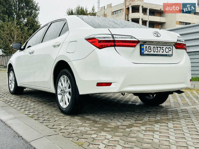 Білий Тойота Королла, об'ємом двигуна 1.6 л та пробігом 72 тис. км за 13700 $, фото 6 на Automoto.ua