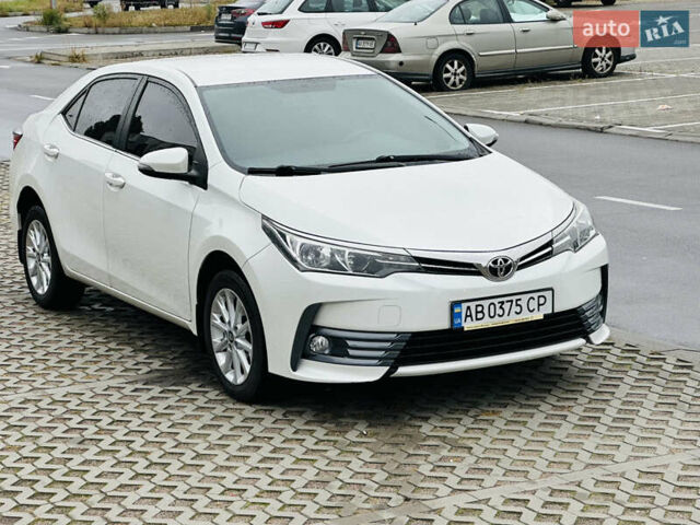 Білий Тойота Королла, об'ємом двигуна 1.6 л та пробігом 72 тис. км за 13700 $, фото 1 на Automoto.ua