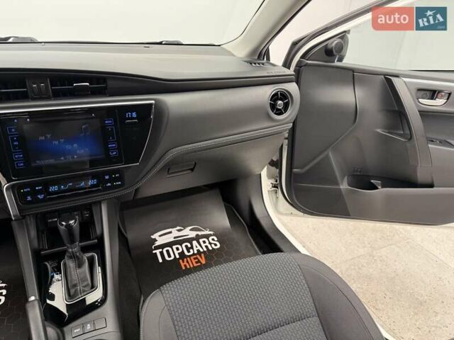 Белый Тойота Королла, объемом двигателя 1.6 л и пробегом 45 тыс. км за 15700 $, фото 38 на Automoto.ua