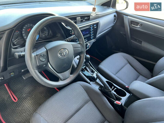 Белый Тойота Королла, объемом двигателя 1.6 л и пробегом 176 тыс. км за 13999 $, фото 6 на Automoto.ua