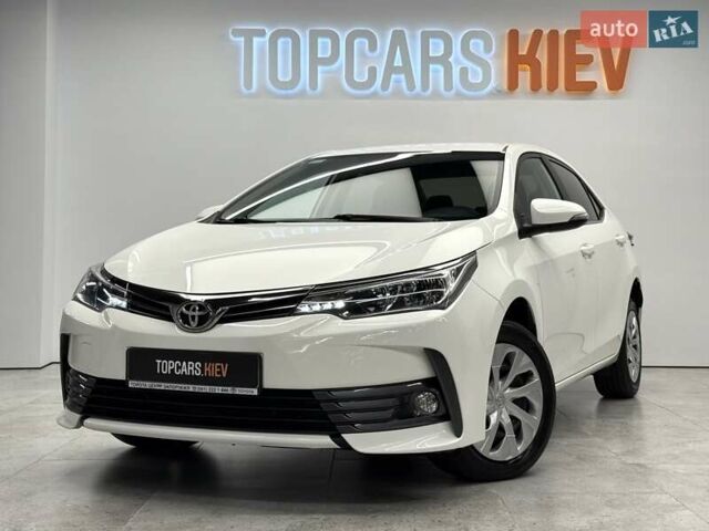 Белый Тойота Королла, объемом двигателя 1.6 л и пробегом 45 тыс. км за 16700 $, фото 15 на Automoto.ua