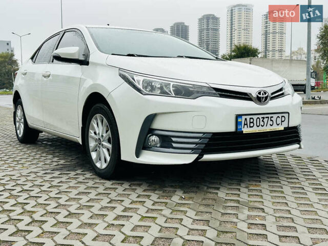 Білий Тойота Королла, об'ємом двигуна 1.6 л та пробігом 72 тис. км за 13700 $, фото 4 на Automoto.ua