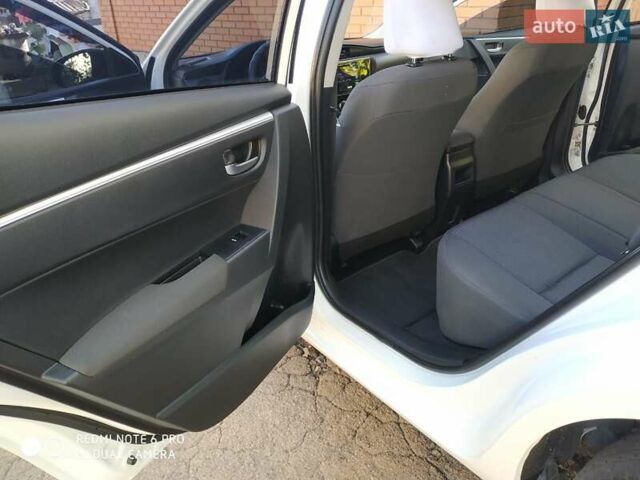 Белый Тойота Королла, объемом двигателя 1.6 л и пробегом 147 тыс. км за 12700 $, фото 11 на Automoto.ua