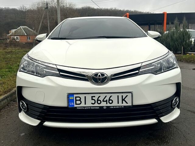 Білий Тойота Королла, об'ємом двигуна 1.6 л та пробігом 205 тис. км за 13700 $, фото 1 на Automoto.ua
