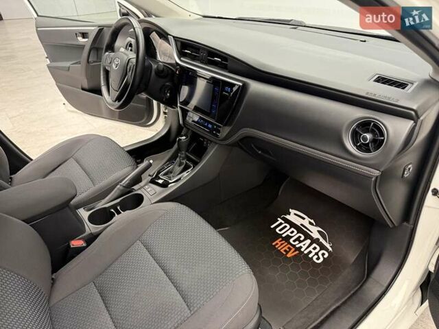 Белый Тойота Королла, объемом двигателя 1.6 л и пробегом 45 тыс. км за 15700 $, фото 33 на Automoto.ua