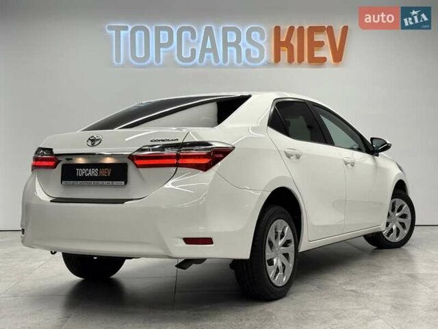 Белый Тойота Королла, объемом двигателя 1.6 л и пробегом 45 тыс. км за 16700 $, фото 6 на Automoto.ua