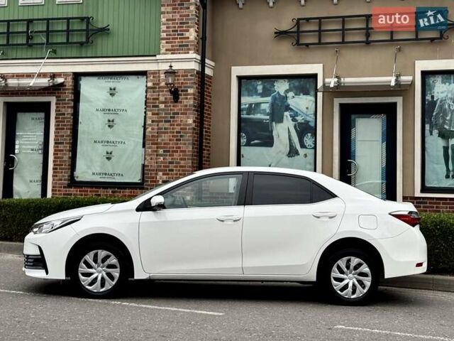Білий Тойота Королла, об'ємом двигуна 1.6 л та пробігом 45 тис. км за 18000 $, фото 8 на Automoto.ua