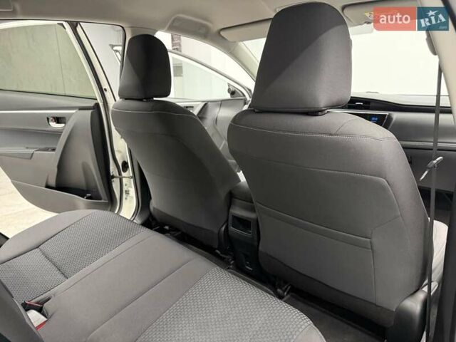 Белый Тойота Королла, объемом двигателя 1.6 л и пробегом 45 тыс. км за 16700 $, фото 28 на Automoto.ua