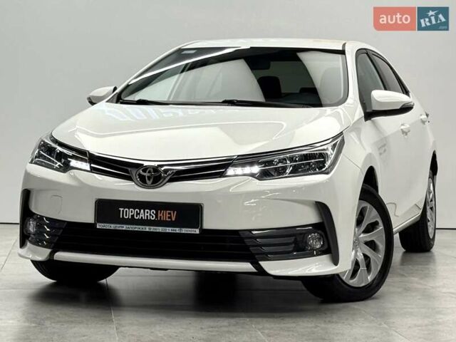 Белый Тойота Королла, объемом двигателя 1.6 л и пробегом 45 тыс. км за 16700 $, фото 16 на Automoto.ua