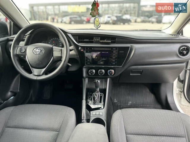 Белый Тойота Королла, объемом двигателя 1.6 л и пробегом 143 тыс. км за 13500 $, фото 14 на Automoto.ua