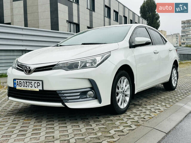Білий Тойота Королла, об'ємом двигуна 1.6 л та пробігом 72 тис. км за 13700 $, фото 17 на Automoto.ua
