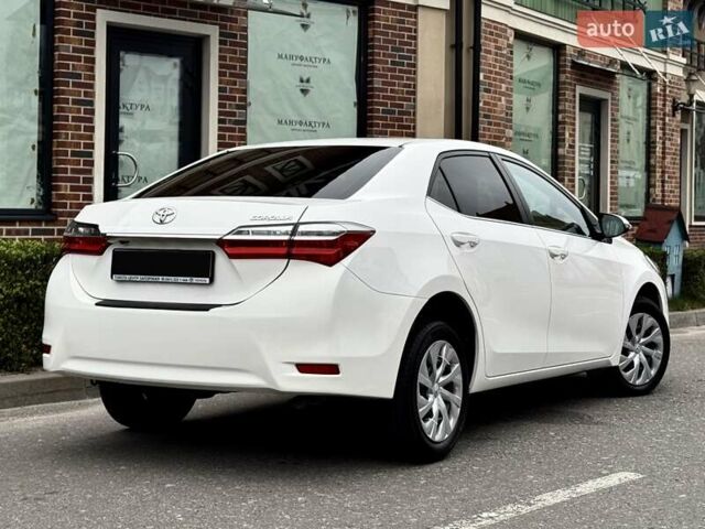 Білий Тойота Королла, об'ємом двигуна 1.6 л та пробігом 45 тис. км за 18000 $, фото 14 на Automoto.ua
