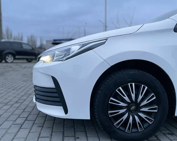 Белый Тойота Королла, объемом двигателя 1.6 л и пробегом 176 тыс. км за 12999 $, фото 9 на Automoto.ua