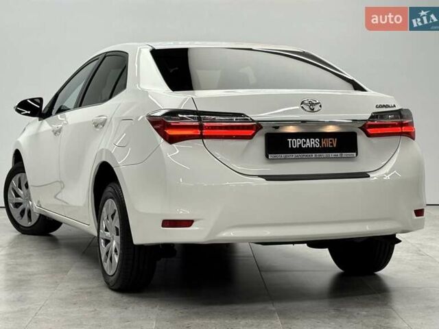 Белый Тойота Королла, объемом двигателя 1.6 л и пробегом 45 тыс. км за 15700 $, фото 7 на Automoto.ua