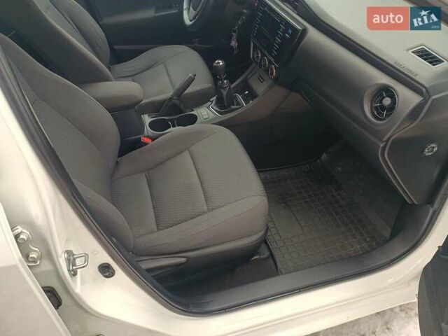 Белый Тойота Королла, объемом двигателя 1.33 л и пробегом 83 тыс. км за 10999 $, фото 14 на Automoto.ua