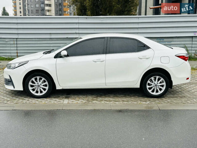 Білий Тойота Королла, об'ємом двигуна 1.6 л та пробігом 72 тис. км за 13700 $, фото 5 на Automoto.ua