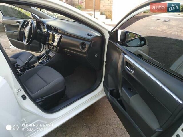 Белый Тойота Королла, объемом двигателя 1.6 л и пробегом 147 тыс. км за 12700 $, фото 9 на Automoto.ua