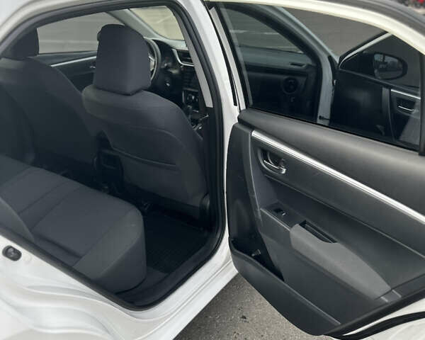 Белый Тойота Королла, объемом двигателя 1.6 л и пробегом 143 тыс. км за 13500 $, фото 11 на Automoto.ua